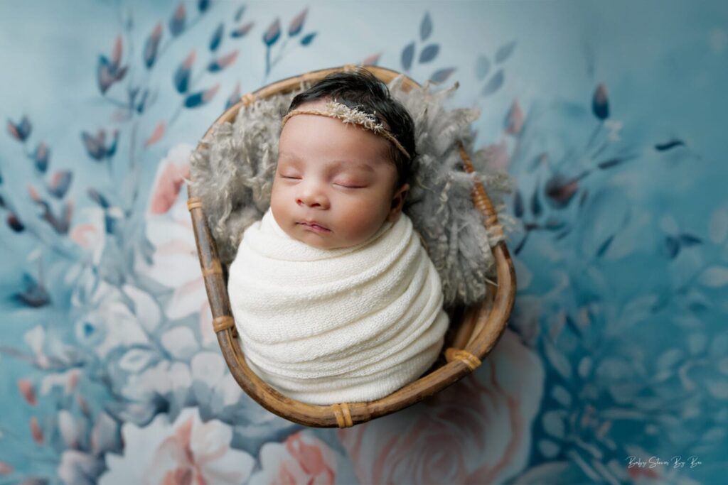 newborn baby wrapped in blanket